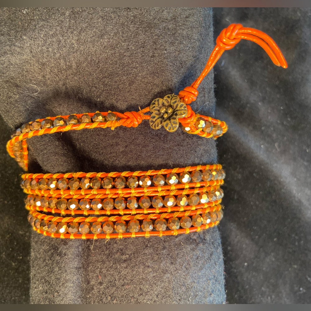 Wrap bracelet,‎ gold tone and orange leather, Unisex,